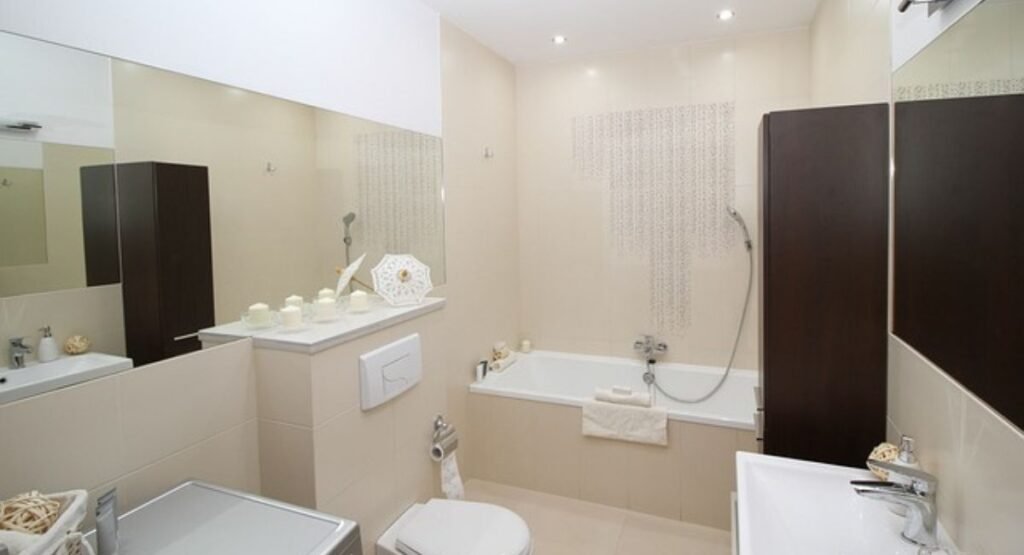 Bright colorful towels and bath mats adding style to a college bathroom