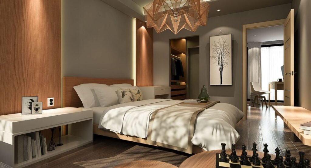 Modern small futon bedroom with low bed and hidden under-mattress storage compartments, organized bedding, and minimal decor