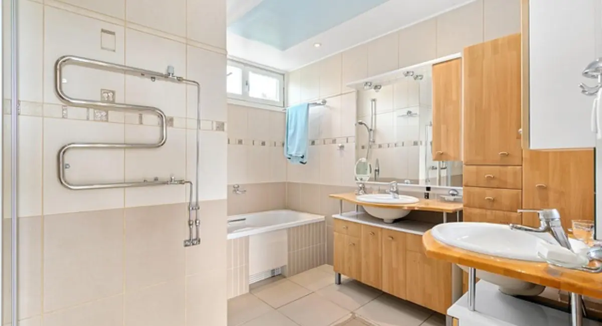 Modern bathroom design with sleek tiles, floating vanity, and contemporary fixtures