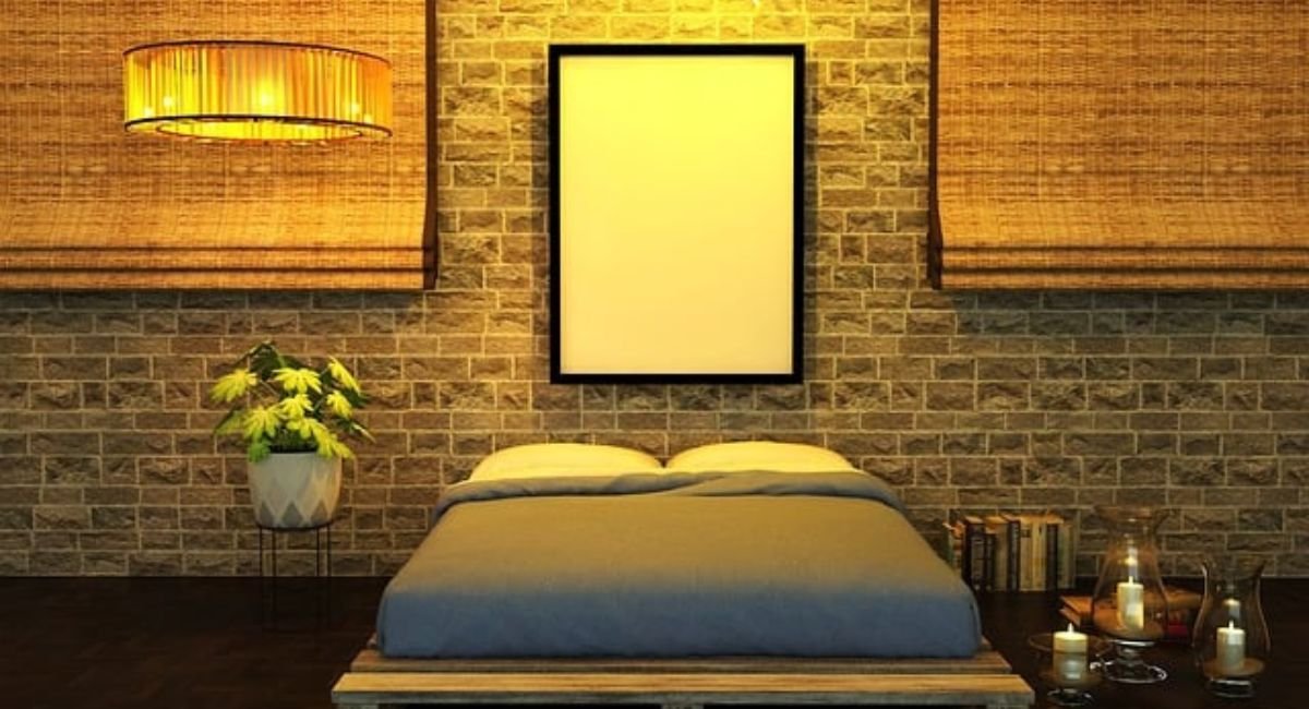 Warm earthy bedroom with terracotta accents, beige linen bedding, oak wood furniture, and cozy layered lighting